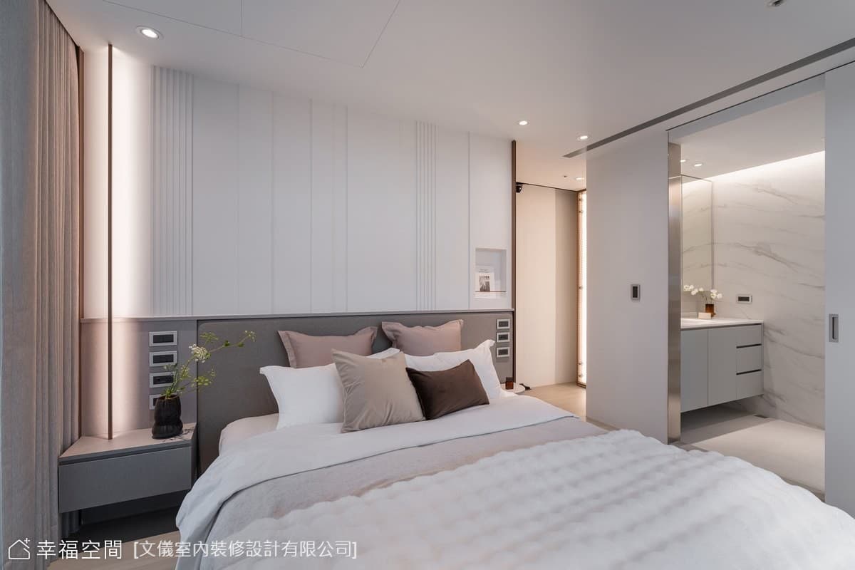 現代主臥灰階床頭設計